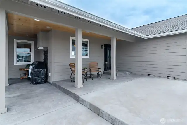 Front patio with grilling station in the breezeway