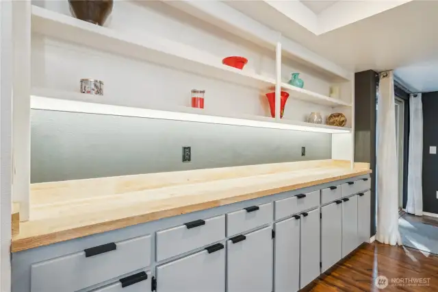 Built in display cabinet with tons of additional storage.