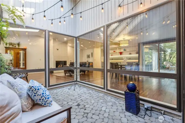 View from atrium into home shows the brightness it adds even on winter days.