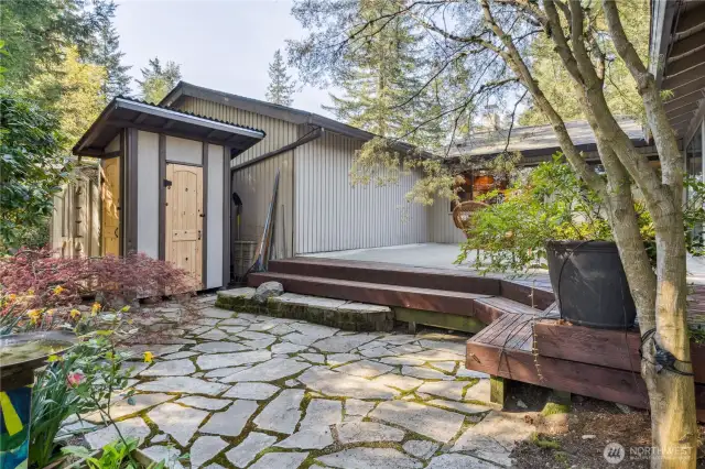 Smartly designed potting shed to was a wonderful addition to this home.