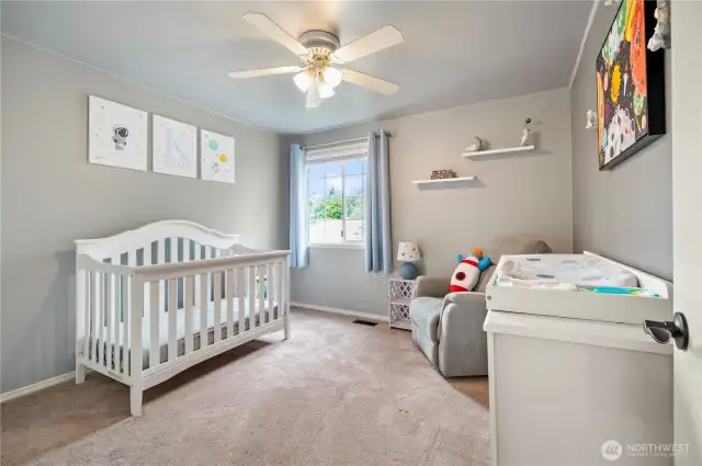 Soft hues and natural light make this the perfect space for little ones.