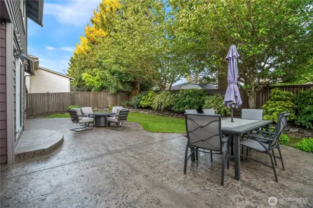 Custom stamped patio with seamless flow from house to yard—perfect for everyday living.