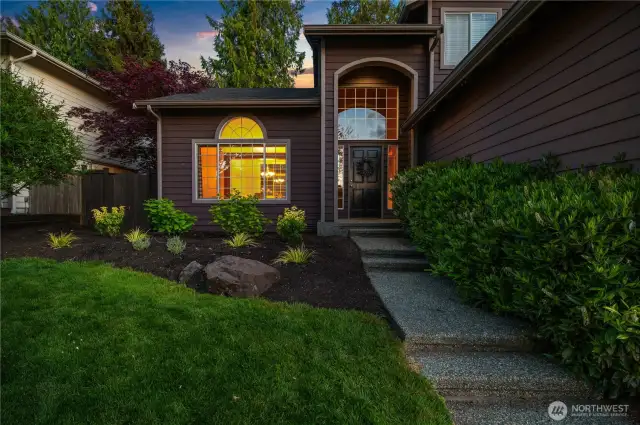 Welcoming curb appeal with fresh landscaping and classic architecture.