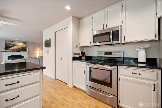 Well-equipped kitchen with stainless steel appliances, granite countertops, and ample cabinet space—perfect for daily cooking or weekend baking.
