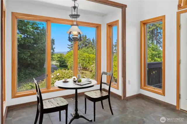 The breakfast nook. Note in the background there's a distance water and mountain view.