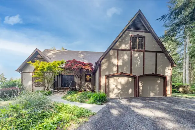 Atop a knoll on five lush acres, this 3-bedroom home has stone front steps, over-sized 2-car garage, and a bonus room above the garage. The driveway was re-graded and graveled in late April, 2025.