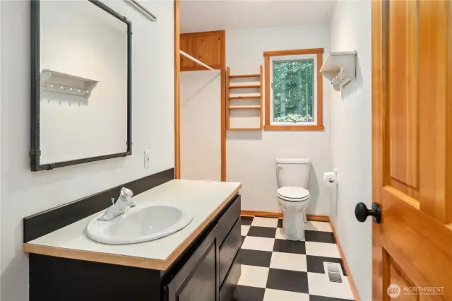 The full bathroom on the second level is conveniently located between the two guest bedrooms.