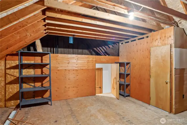 Not included in the square footage is an approx. 24' x 24' attic room. The door at middle-right opens to the upper hallway, offering easy access to this unfinished space. A 3-step stairway on the right leads to a narrow door, allowing you to walk straight in.