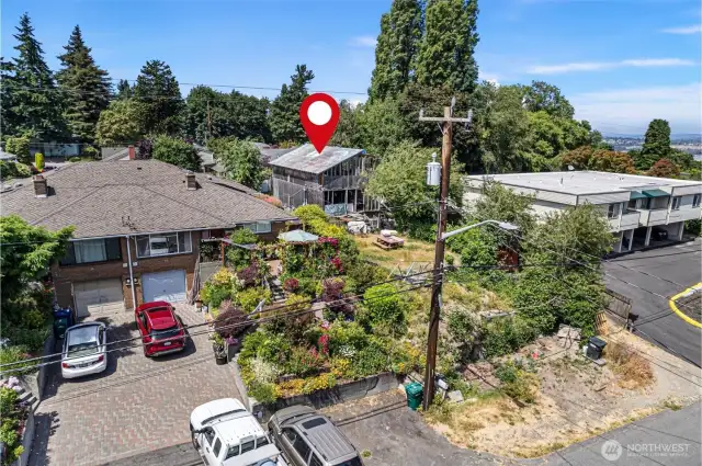 Multi-family homes on both sides.