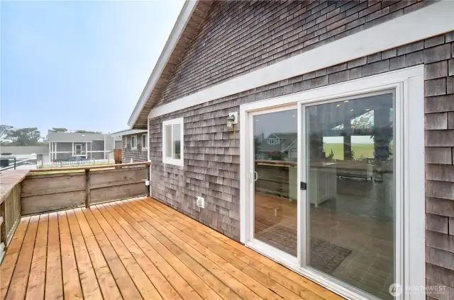 Deck off the Kitchen for you morning coffee and Sunrises