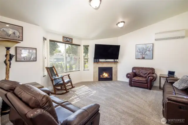 Vaulted ceilings throughout the open concept living space.