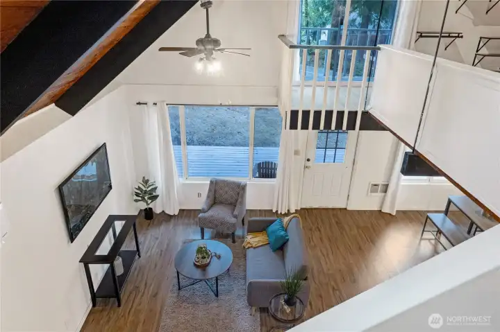 Peering into the living room from the loft