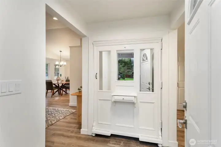 Indoors, you can hang your hat in the unique custom entryway closet.