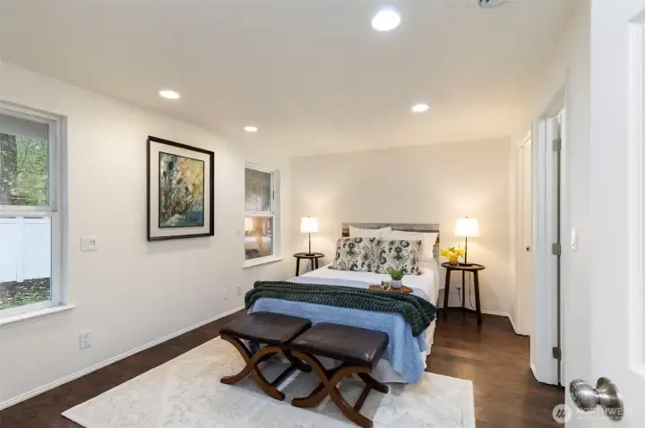 Primary suite offers a walk in closet and private bath.