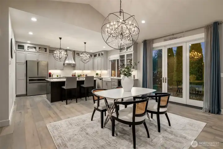 Abundant natural light floods this space from the custom French doors