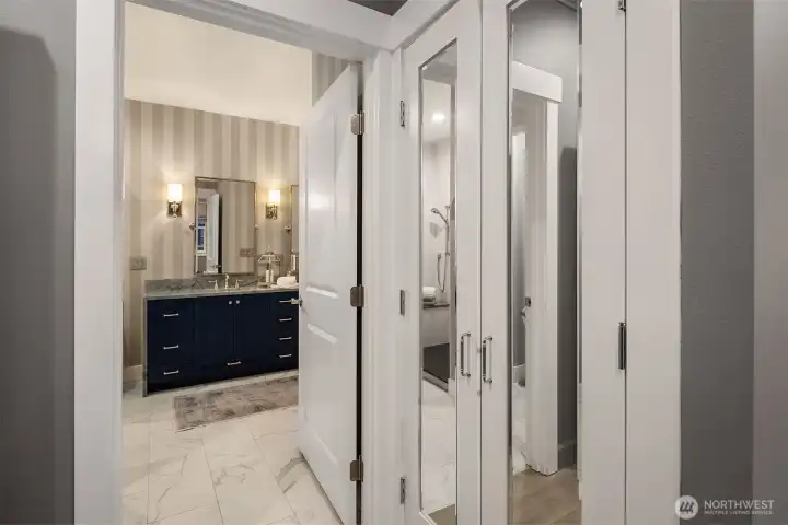 French door entry to the elegant primary closet