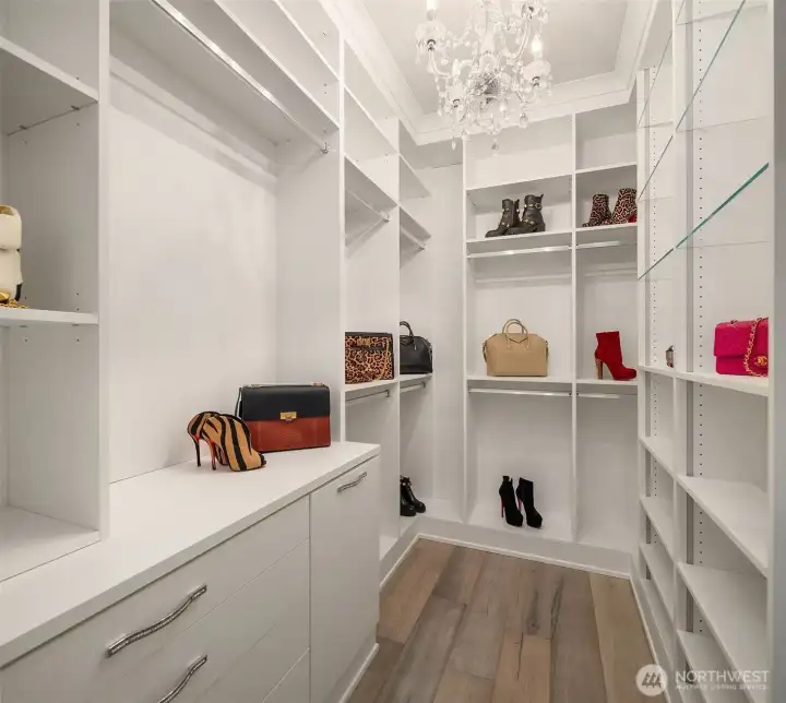 California Closet in primary bedroom with room for all your clothes