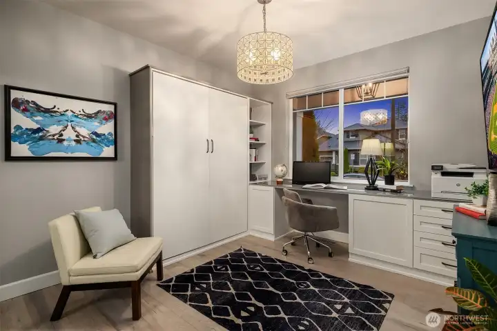 2nd bedroom with California Closet work station and Murphy bed for guests.