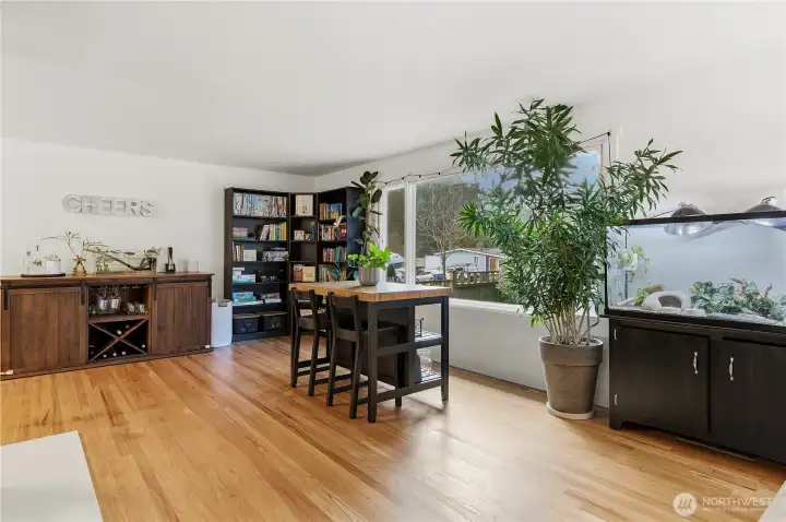 Main Floor Living Room with Wood Fireplace