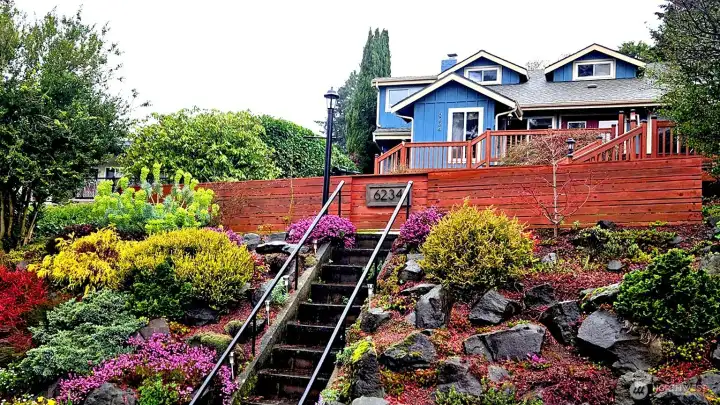 Thoughtfully landscaped and elevated to capture Lake Washington views.