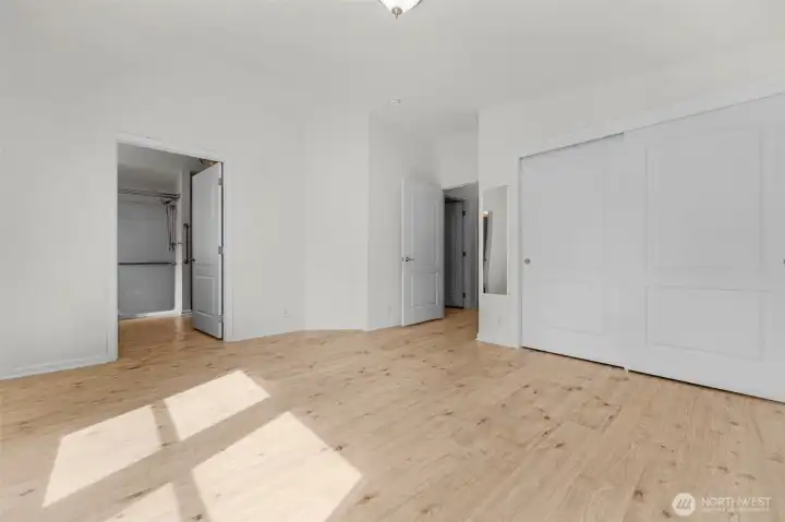 Another view of the primary bedroom. The closet is very large.