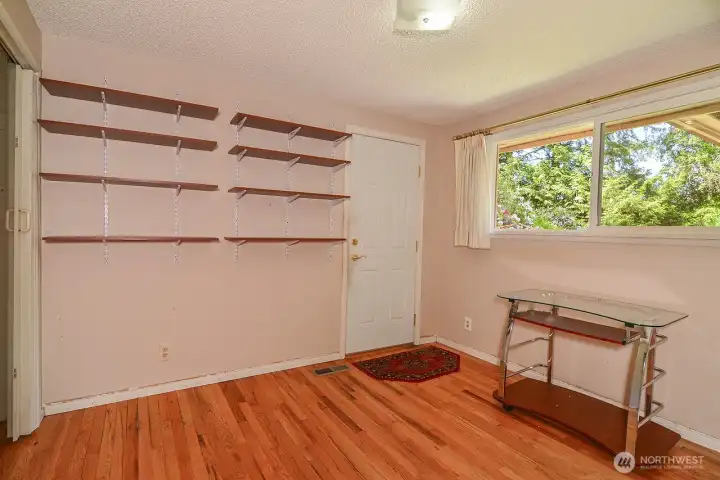Office with door to garage. Possible 4th bedroom as it has a closet.