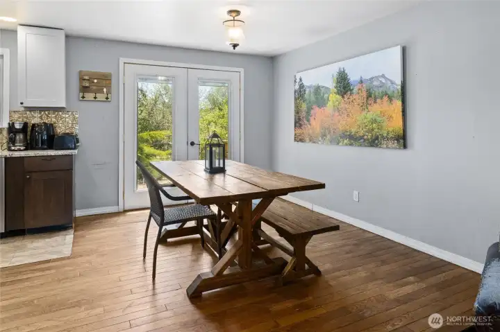 Dining area provides access to rear deck.