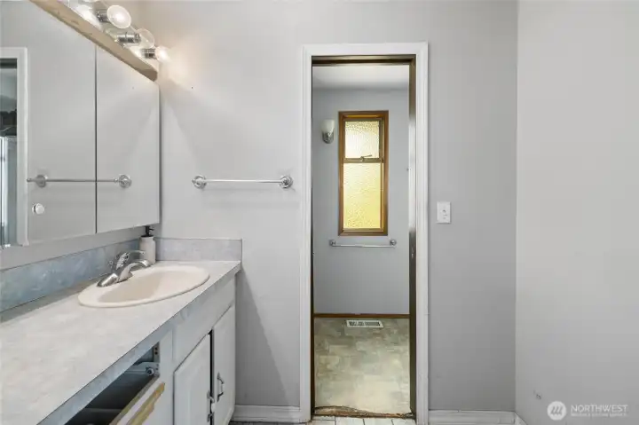 Primary bathroom could use a little bit of work too.
