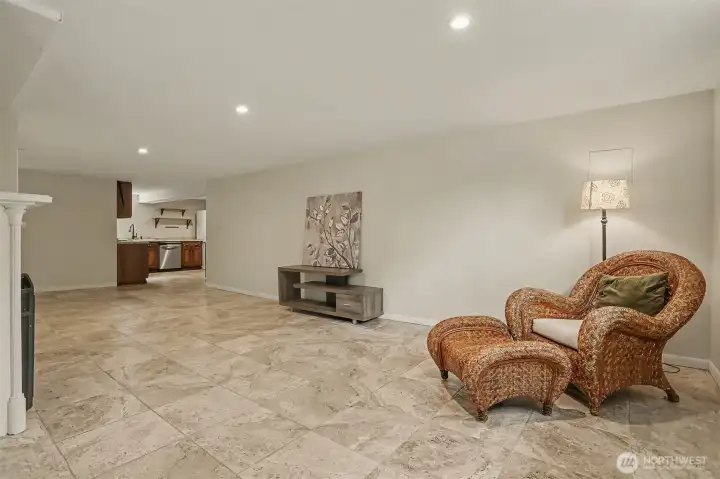 Lower level living, dining area. Potential for adding a bedroom or office here.