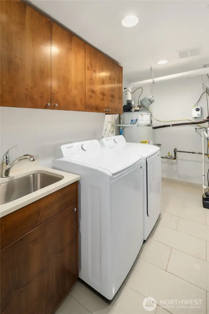 utility room with tons of storage.