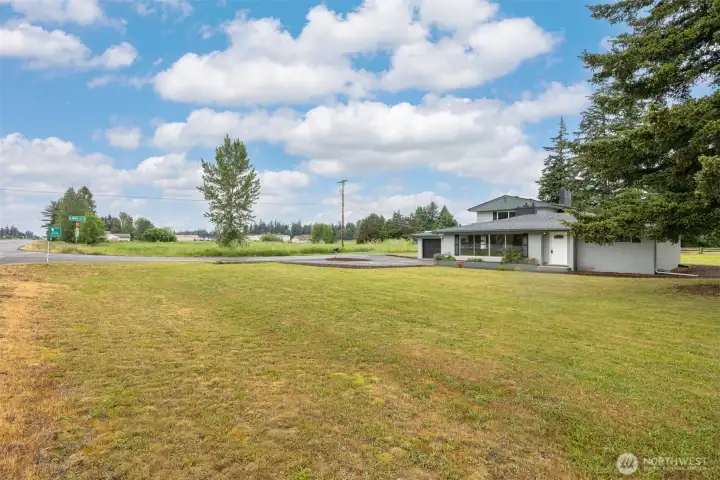 Large front outdoor area along with large backyard garden and play space. Large front outdoor area along with large backyard garden and play space.