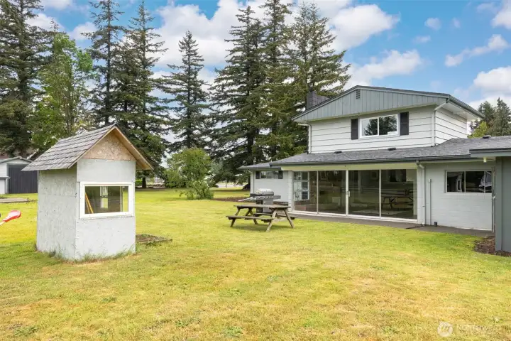 Small playhouse and great activity area at the back house. Convenient outdoor storage space close to house and play area, also has firewood storage space. Small playhouse and great activity area at the back house. Convenient outdoor storage space close to house and play area, also has firewood storage space.