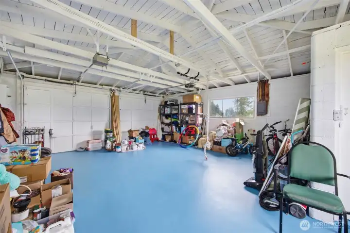 Extra large garage space has been finished off nicely and used a home gym workout area. There is also a sealed off storage area for items you might want to keep separate. Extra large garage space has been finished off nicely and used a home gym workout area. There is also a sealed off storage area for items you might want to keep separate.