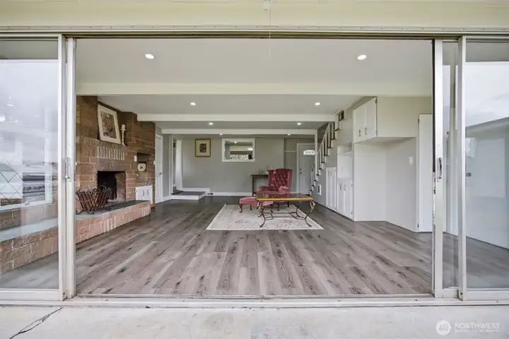 Large sliding glass doors allows the inside and outside to blend. How great to be able to open up to backyard and make living indoor and outdoor become one living area. A delightful options for when you're entertain with your tribe. Imagine those epic gatherings. Large sliding glass doors allows the inside and outside to blend. How great to be able to open up to backyard and make living indoor and outdoor become one living area. A delightful options for when you're entertain with your tribe. Imagine those epic gatherings.