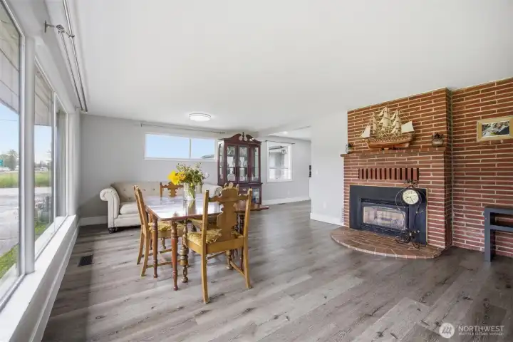Brick accented gas fireplace offers you a cozy spot to enjoy on a cooler day. Brick accented gas fireplace offers you a cozy spot to enjoy on a cooler day.
