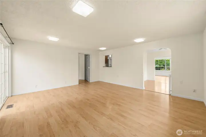 Family room with slider leading to outdoor space.