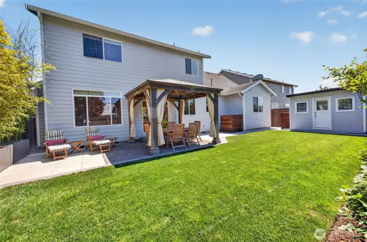 Fully fenced, professionally landscaped with sprinkler system Fully fenced, professionally landscaped with sprinkler system