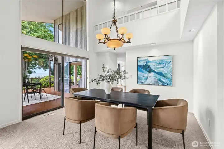 Wall of windows in formal dining room along with the wide sliders to your outside dining as well Wall of windows in formal dining room along with the wide sliders to your outside dining as well