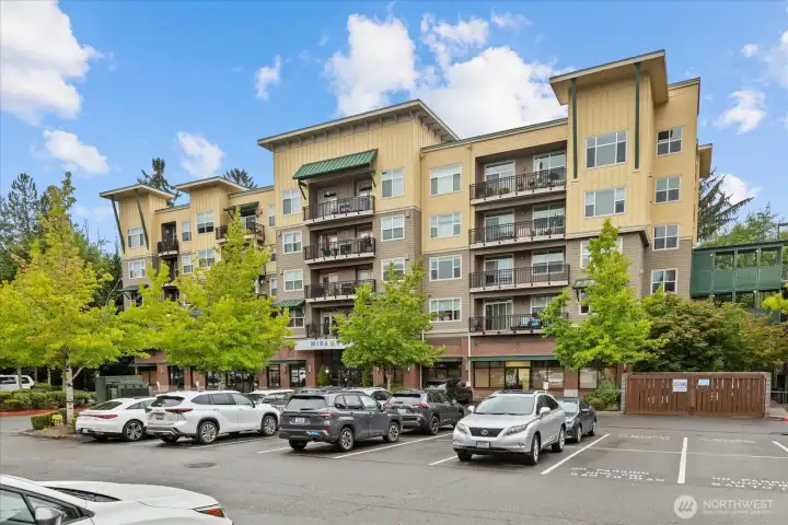 Front of condos, parking garage to right of complex. Front of condos, parking garage to right of complex.