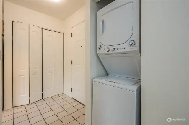 Laundry is in an alcove adjacent to the front door.