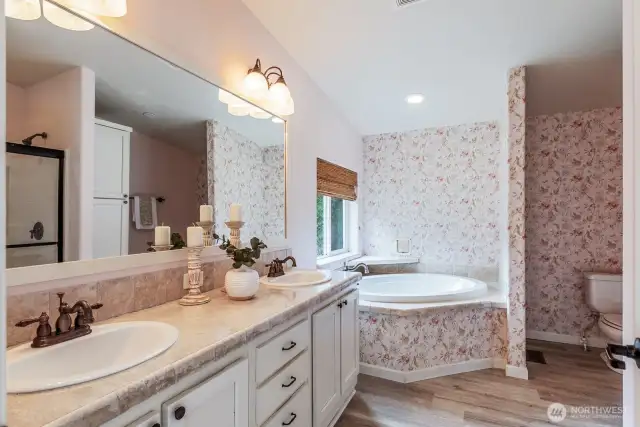 Main home ensuite bathroom with tub and separate shower