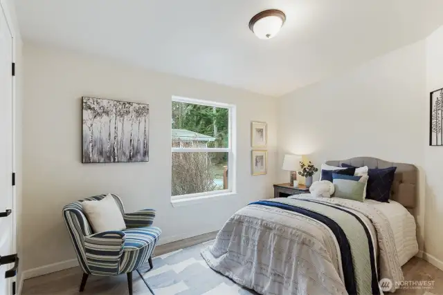 second bedroom with access to small catio