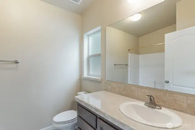 ADU ensuite primary bath with tub/shower