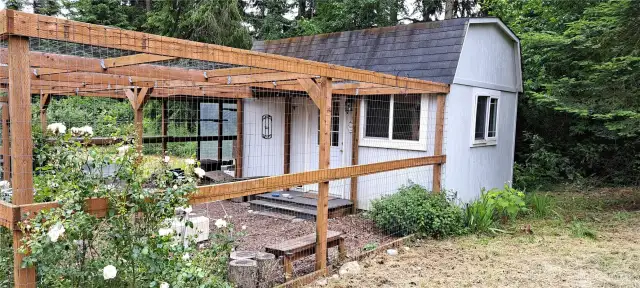 Cabin with roses in bloom
