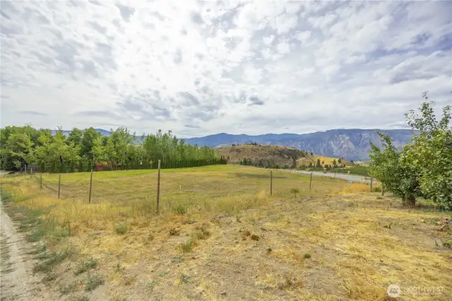 Easy access to the road in and the irrigation can is in the distance to the right, just off the the road.