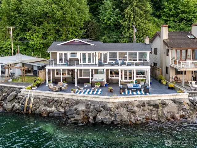 Wake up to breathtaking views of Seattle to the north, the Olympic peninsula to west, and stunning sunrises to the east-all from this exceptional waterfront home!