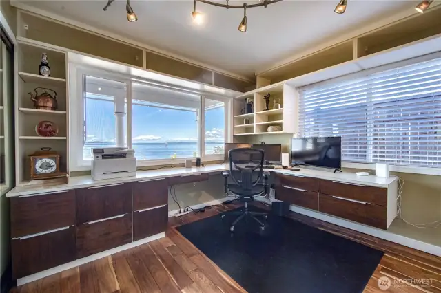 This is more than a workspace. It's a calm, light-filled retreat designed for both productivity and peace of mind. As you step into this room, your eyes are immediately drawn to the large window that frames the water like a living painting. The Murphy bed makes this the perfect guest retreat.