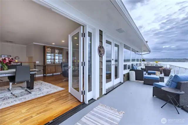 Stepping through the french doors you emerge onto the elevated deck, greeted by the fresh sea air, and those captivating views of the Sound. Catch an eagle soaring by or a seal bobbing it's head out of the water. Space galore to entertain or just relax in quietude.