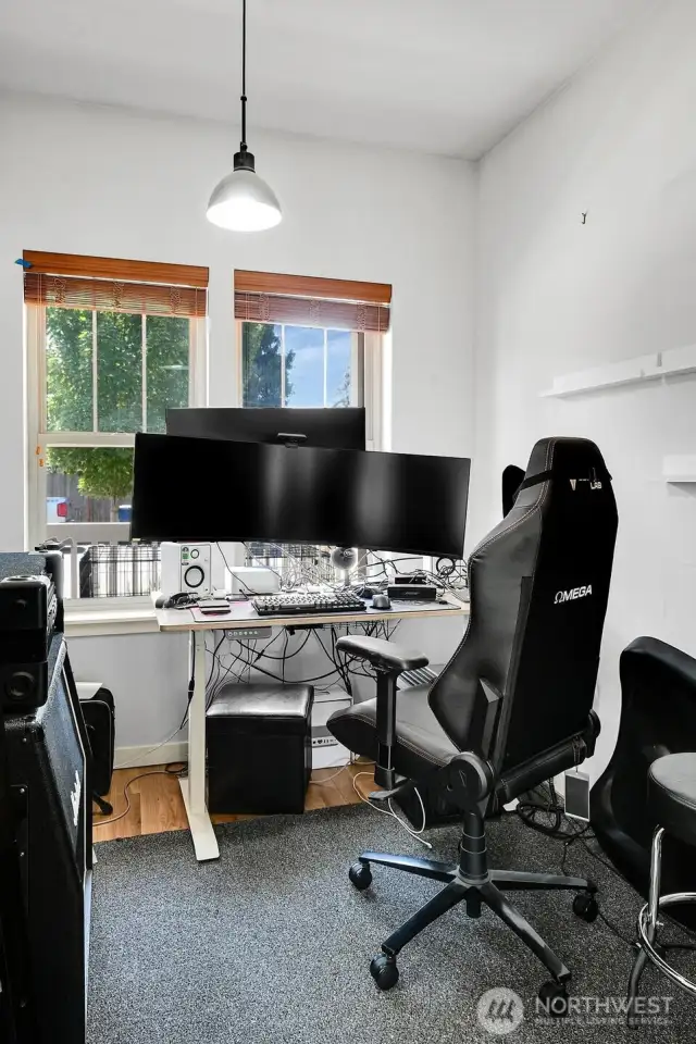 Main floor office with sliding pocket doors.