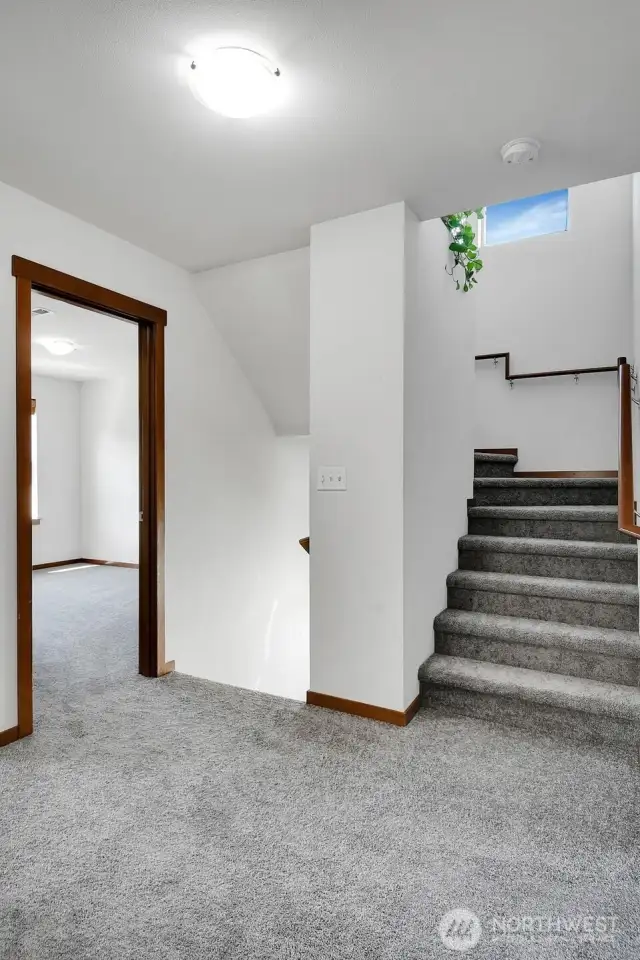 Landing on 2nd floor looking up stairs to 3rd floor.
